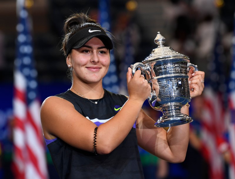 Sept 7, 2019; Flushing, NY, USA;  Bianca Andreescu of Canada with the US Open championship trophy after beating Serena Williams of the USA in the womenâ€™s singles final on day thirteen of the 2019 U.S. Open tennis tournament at USTA Billie Jean King Nati